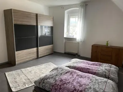 Ein Bett oder Betten in einem Zimmer der Unterkunft Ferienwohnung Rosch