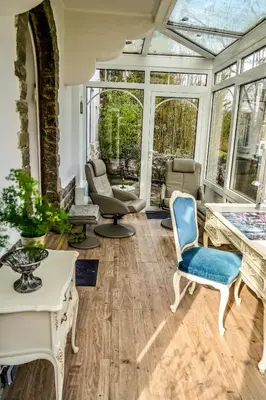 Ein Sitzbereich in der Unterkunft Ferienwohnung Kaiserblick