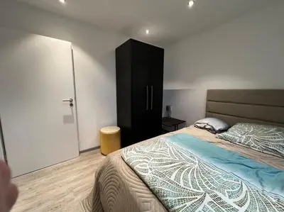 Ein Bett oder Betten in einem Zimmer der Unterkunft Zentrale große Wohnung in Prüm für erholsamen Urlaub