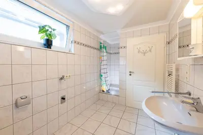 Ein Badezimmer in der Unterkunft Pitlane-Apartment