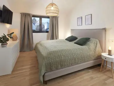 Ein Bett oder Betten in einem Zimmer der Unterkunft Holiday home Chalet 48