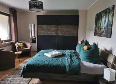 Ein Bett oder Betten in einem Zimmer der Unterkunft Ferienwohnung Hedi