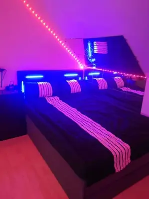 Ein Bett oder Betten in einem Zimmer der Unterkunft Wohnung am Kurpark mit privater Innensauna & LED! Schlüsselbox