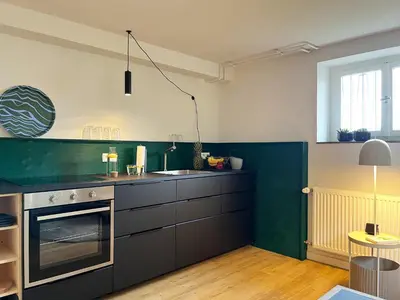 Küche/Küchenzeile in der Unterkunft Kolberg Studio - Moderne Ferienwohnung in Boppard