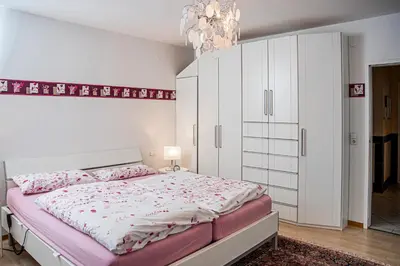 Ein Bett oder Betten in einem Zimmer der Unterkunft Haus Helga