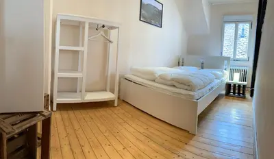 Ein Bett oder Betten in einem Zimmer der Unterkunft Ferienhaus Am Balduinstor