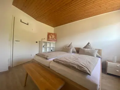 Ein Bett oder Betten in einem Zimmer der Unterkunft Haus Erika/ Fam. Frevel