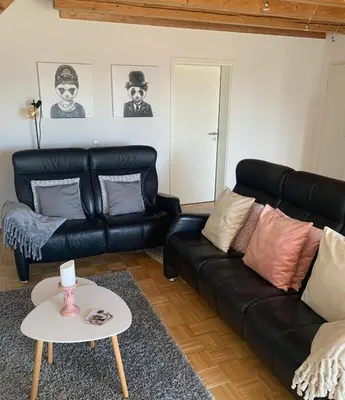 Ein Sitzbereich in der Unterkunft Ferienwohnung Leonardo