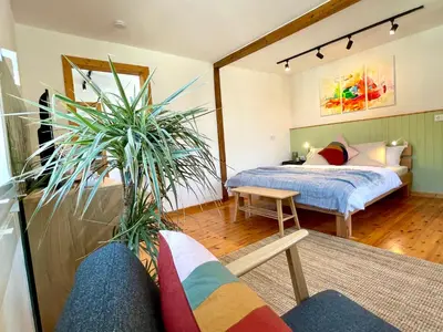 Ein Bett oder Betten in einem Zimmer der Unterkunft RiversideMosel Burg FREE Netflix PrimeVideo eBikeParking