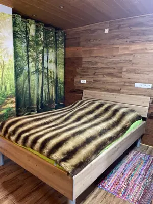 Ein Bett oder Betten in einem Zimmer der Unterkunft Farben Haus