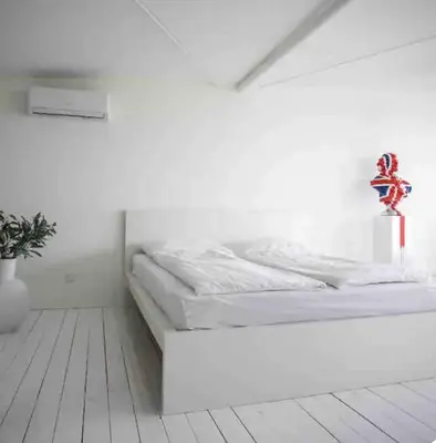 Ein Bett oder Betten in einem Zimmer der Unterkunft Whiteloft