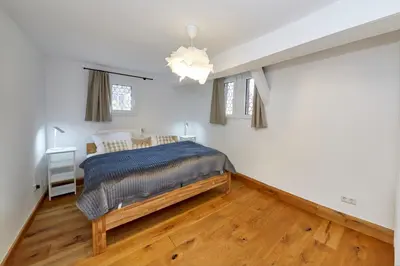 Ein Bett oder Betten in einem Zimmer der Unterkunft Ferienwohnung Badstube Anno 1583