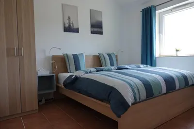 Ein Bett oder Betten in einem Zimmer der Unterkunft ‘t Boszicht
