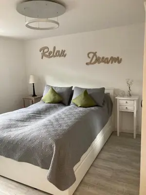 Ein Bett oder Betten in einem Zimmer der Unterkunft Bachperle