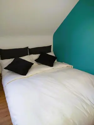 Ein Bett oder Betten in einem Zimmer der Unterkunft Apartment mit Rheinblick Koblenz