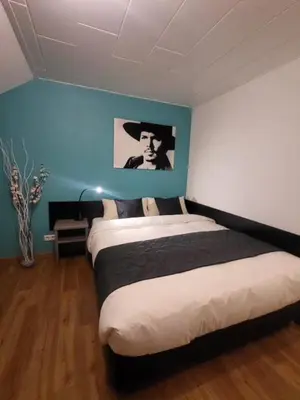 Ein Bett oder Betten in einem Zimmer der Unterkunft Apartment mit Rheinblick Koblenz