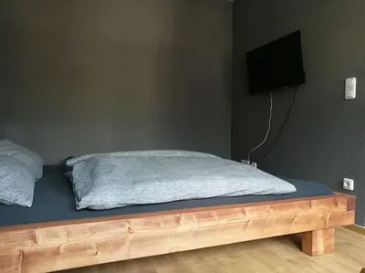 Ein Bett oder Betten in einem Zimmer der Unterkunft Ganzes Haus, Zentrale Lage Adenau Nürburgring