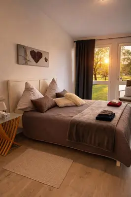 Ein Bett oder Betten in einem Zimmer der Unterkunft Kleine Milchbar Barrierefrei in den Bergen auf dem Hof Grindelborn