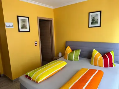 Ein Bett oder Betten in einem Zimmer der Unterkunft Pensione Italia