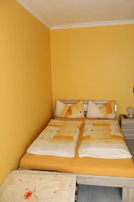 Ein Bett oder Betten in einem Zimmer der Unterkunft Pensione Italia