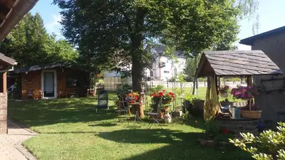 Ein Garten an der Unterkunft Ferienwohnung Virginija