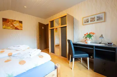 Ein Bett oder Betten in einem Zimmer der Unterkunft Ferienwohnung Virginija