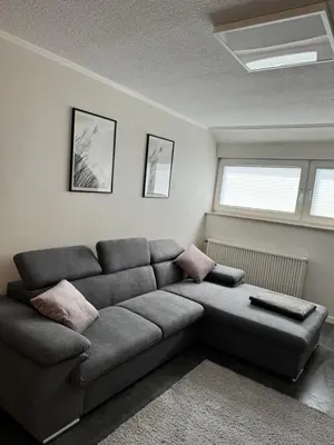 Ein Sitzbereich in der Unterkunft Ferienwohnung Maas