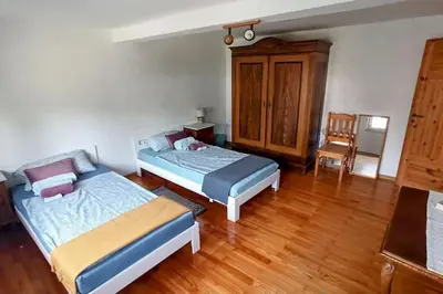 Ein Bett oder Betten in einem Zimmer der Unterkunft Casa Filada - Ferienort für Alle