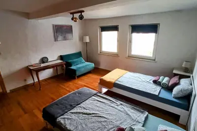 Ein Bett oder Betten in einem Zimmer der Unterkunft Casa Filada - Ferienort für Alle