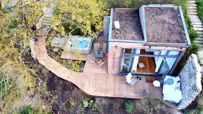Ein Garten an der Unterkunft Tinyhouse Minimalus III mit Whirlpool im Grünen