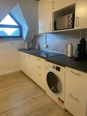 Küche/Küchenzeile in der Unterkunft Charmante Wohnungen direkt in der Stadtmitte