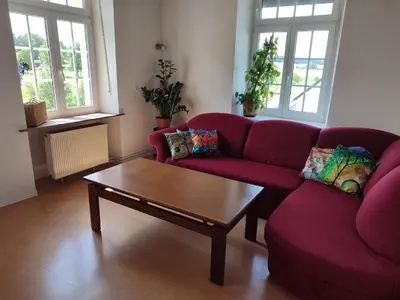 Ein Sitzbereich in der Unterkunft Im großen K