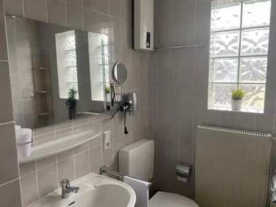 Ein Badezimmer in der Unterkunft Ferienwohnung 2 Am Petersberg