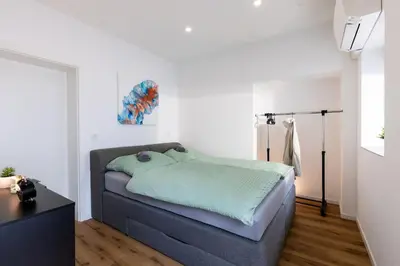 Ein Bett oder Betten in einem Zimmer der Unterkunft Lava-Loft (Ferienwohnung)