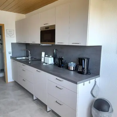 Küche/Küchenzeile in der Unterkunft Bichlhof Bärfra Ferienwohnung Hunsrück
