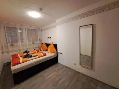 Ein Bett oder Betten in einem Zimmer der Unterkunft Ferienwohnung Sonnenblume