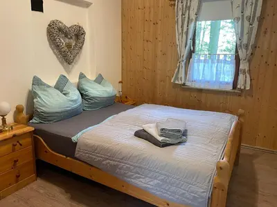Ein Bett oder Betten in einem Zimmer der Unterkunft Ferienhaus Mellicher Berg