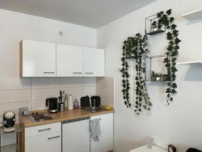 Küche/Küchenzeile in der Unterkunft Cozy Central Apartment