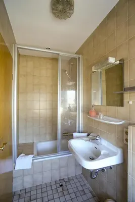 Ein Badezimmer in der Unterkunft Gästehaus Rebstock