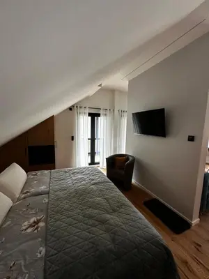 Ein Bett oder Betten in einem Zimmer der Unterkunft Ferienwohnungen Heimatliebe