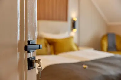 Ein Bett oder Betten in einem Zimmer der Unterkunft Hoffmanns Weinstube