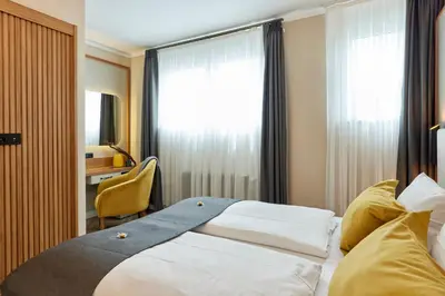Ein Bett oder Betten in einem Zimmer der Unterkunft Hoffmanns Weinstube