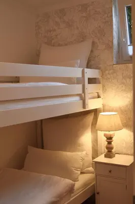 Ein Bett oder Betten in einem Zimmer der Unterkunft Ferienwohnung Waldborn-Suite an der Mosel