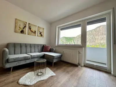 Ein Sitzbereich in der Unterkunft Ferienwohnung Rotenfelsblick