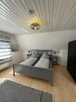 Ein Bett oder Betten in einem Zimmer der Unterkunft Haus Daniela Oberstadt