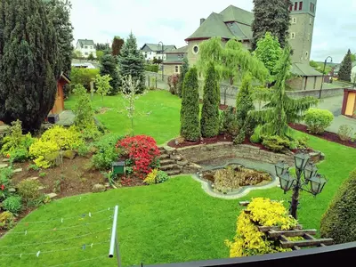 Ein Garten an der Unterkunft Haus Claudia