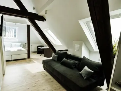 Ein Bett oder Betten in einem Zimmer der Unterkunft MoselUnion - Haus Burg Chaussee