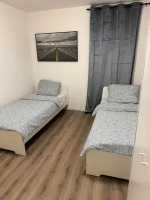 Ein Bett oder Betten in einem Zimmer der Unterkunft Gemütliches Zimmer in Rheinnähe