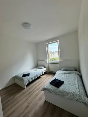 Ein Bett oder Betten in einem Zimmer der Unterkunft Gemütliches Zimmer in Rheinnähe