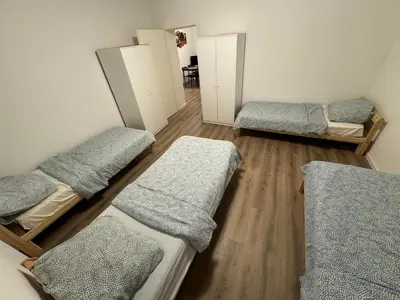 Ein Bett oder Betten in einem Zimmer der Unterkunft Reisende Ecke